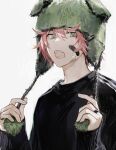 1boy bandaid bandaid_on_face beanie black_shirt earflap_beanie fangs green_eyes hair_between_eyes hands_up hat highres holding holding_clothes holding_hat jewelry long_sleeves looking_at_viewer male_focus messy_hair open_mouth original pale_skin pink_hair pom_pom_(clothes) pom_pom_beanie ring shirt short_hair slit_pupils solo suechimu teeth upper_body upper_teeth_only white_background 
