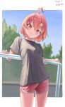  1girl :3 ahoge blush djmax djmax_respect grey_shirt hair_ornament hairclip highres looking_at_viewer medium_hair orange_hair red_eyes red_shorts rophe_(djmax) shirt short_shorts shorts solo standing star_(symbol) syc2159 