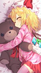  1girl absurdres alternate_costume closed_eyes closed_mouth cowboy_shot crystal_wings flandre_scarlet highres nekocatchatpura on_bed pajamas pink_pajamas pointy_ears red_ribbon red_skirt ribbon skirt sleeping solo stuffed_animal stuffed_toy teddy_bear thigh-highs touhou 