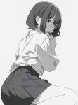  1girl bob_cut camera from_behind greyscale hair_behind_ear highres holding holding_camera looking_at_viewer looking_back miniskirt monochrome original pleated_skirt shimkarom shirt short_hair simple_background sitting skirt solo_focus 