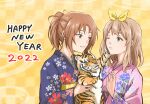  2022 2girls animal blonde_hair blue_kimono brown_hair closed_mouth commentary_request curryisfriend floral_print green_eyes hair_ribbon hands_up happy_new_year hibike!_euphonium highres holding holding_animal japanese_clothes kimono long_hair long_sleeves looking_at_another medium_hair multiple_girls nakagawa_natsuki new_year one_eye_closed parted_lips pink_kimono ponytail ribbon smile tiger violet_eyes yellow_ribbon yoshikawa_yuuko 