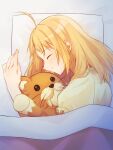  1girl ahoge artoria_pendragon_(fate) blonde_hair closed_eyes closed_mouth dun_dudu fate/stay_night fate_(series) happy highres hugging_object pajamas saber_(fate) short_hair sleeping solo stuffed_animal stuffed_lion stuffed_toy yellow_pajamas 