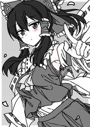  1girl ascot bare_shoulders blush bow closed_mouth commentary_request cowboy_shot detached_sleeves frilled_bow frilled_shirt_collar frills greyscale hair_between_eyes hair_bow hakurei_reimu hand_up highres medium_hair monochrome ribbon-trimmed_sleeves ribbon_trim sazanami_mio shirt sidelocks skirt sleeveless sleeveless_shirt solo spot_color standing touhou 