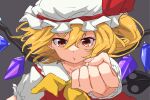  1girl ascot blonde_hair clenched_hand collared_shirt commentary_request flandre_scarlet grey_background hair_between_eyes hat ito_(itokayu) looking_at_viewer medium_hair mob_cap orange_eyes outstretched_arm parted_lips red_vest shirt simple_background solo touhou upper_body vest white_mob_cap white_shirt wings yellow_ascot 