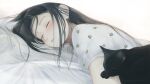  1girl absurdres black_cat black_hair blanket cat closed_eyes commentary floral_print floral_print_shirt highres junito715 long_hair messy_hair original sleeping 