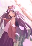  1girl arms_behind_back blunt_bangs blurry blurry_background cherry_blossoms commentary falling_petals hairband highres hololive hololive_english kenjun light_blush long_hair long_sleeves looking_at_viewer mole mole_under_eye neckerchief ninomae_ina&#039;nis petals pointy_ears purple_hair red_neckerchief school_uniform serafuku skirt smile solo virtual_youtuber 