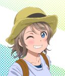  1girl ;d blue_eyes blush brown_hair collarbone commentary_request green_background grey_shirt grin hat highres looking_at_viewer love_live! love_live!_sunshine!! medium_hair one_eye_closed polka_dot polka_dot_background sano_keiichi shirt sidelocks smile solo straw_hat two-tone_background upper_body watanabe_you white_background 