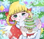 1girl blonde_hair blush blush_stickers bow braided_hair_rings capelet christmas_tree closed_mouth eyelashes fujishima_moyu fur-trimmed_capelet fur_trim green_eyes hair_bow hair_rings highres long_sleeves looking_at_viewer original pink_nails red_bow red_capelet smile snow_globe snowflakes solo upper_body white_wings wings 