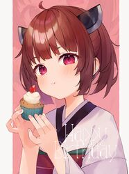  1girl ahoge blush brown_hair closed_mouth commentary_request cupcake eating food food_bite hands_up happy_birthday headgear highres holding holding_food japanese_clothes kimono looking_at_viewer obi obiage obijime outside_border pillarboxed pink_background red_eyes sash short_hair solo tananuki touhoku_kiritan twintails upper_body voiceroid white_kimono zoom_layer 