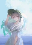  1girl absurdres breasts dress firefly_(honkai:_star_rail) floating_hair grey_hair hair_between_eyes hair_ornament hand_on_headwear hat highres honkai:_star_rail honkai_(series) long_hair looking_at_viewer medium_breasts ocean saigederikku sky smile solo two-tone_eyes white_dress 