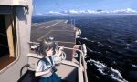  1girl 3others :d absurdres ahoge aircraft aircraft_carrier airplane black_hair blue_eyes blue_neckerchief blue_skirt camera fighter_jet fishing fujian_(aircraft_carrier) highres holding holding_camera j-20 jet looking_at_viewer military_vehicle multiple_others neckerchief ocean open_mouth original people&#039;s_liberation_army people&#039;s_liberation_army_navy pointing school_uniform serafuku ship shirt short_hair skirt smile solo_focus teeth upper_teeth_only user_wgvw4555 warship watercraft white_shirt 