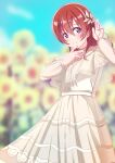  1girl ajapar blue_eyes blurry blurry_background closed_mouth commentary_request dress emma_verde flower hair_between_eyes hair_down hair_ornament hand_up highres koisuru_sunflower long_sleeves looking_at_viewer love_live! love_live!_nijigasaki_high_school_idol_club medium_hair redhead sidelocks smile solo standing sunflower upper_body white_dress 