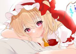  1girl ascot bed_sheet blonde_hair blush bow commentary_request crystal_wings dress feet_out_of_frame flandre_scarlet hat long_hair looking_at_viewer lying mob_cap on_stomach pink_eyes red_bow red_dress short_sleeves side_ponytail simple_background smile tosakaoil touhou white_background white_hat wings yellow_ascot 