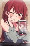  1girl ;) blush brown_eyes cellphone closed_mouth commentary_request highres idolmaster ito_(itokayu) long_hair long_sleeves looking_at_viewer one_eye_closed osaki_amana phone recurring_image redhead smartphone smile solo upper_body 