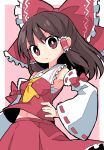  1girl :&lt; ascot azumi_haruhito border bow brown_hair detached_sleeves frilled_bow frilled_hair_tubes frills hair_tubes hakurei_reimu hands_on_own_hips highres midriff_peek navel pink_background red_bow red_eyes red_skirt redhead ribbon_trim skirt skirt_set solo touhou v-shaped_eyebrows white_border wind yellow_ascot 