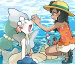  1girl bare_shoulders black_hair brionne brown_eyes evolutionary_line floral_print floral_print_shirt from_side hat highres looking_at_another open_mouth orange_shirt pokemon pokemon_(creature) pokemon_usum popplio primarina selene_(pokemon) shirt shorts sleeveless sleeveless_shirt sstoh teeth upper_teeth_only water white_shorts 
