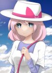  1girl blue_eyes blue_sky closed_mouth clouds cloudy_sky commentary_request hair_between_eyes hat long_sleeves looking_at_viewer medium_hair mole mole_under_eye pink_hair pokemon pokemon_bw2 shirt sky smile solo white_hat white_shirt yancy_(pokemon) yuuki510510 