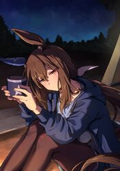  1girl admire_vega_(umamusume) animal_ears blue_jacket blue_shirt blush brown_hair brown_pantyhose camping closed_mouth commentary_request cup dot_mouth hair_between_eyes highres holding holding_cup hood hood_down hooded_jacket horse_ears horse_girl jacket knees_up long_hair looking_at_viewer low_ponytail night night_sky open_clothes open_jacket outdoors pantyhose red_eyes shirt sitting sky solo star_(symbol) star_print starheart umamusume 