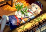  blonde_hair blue_eyes capelet couch daffodil flower frills hairband highres looking_at_viewer lying on_back realmbw short_hair solo touhou wrist_cuffs 