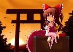  bow box brown_eyes brown_hair detached_sleeves donation_box hair_bow hakurei_reimu long_hair miko pocky poco_(pocoyb) pocoyb short_hair solo sunset torii touhou 