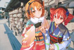  2girls a.i._voice adachi_rei alternate_costume arrow_(projectile) black_headband blue_kimono cloud_print commentary_request cup day double-parted_bangs drill_hair ema flat_chest floral_print floral_print_kimono grin hair_between_eyes hatsumoude headband headlamp headphones highres house japanese_clothes kasane_teto kimono multiple_girls new_year orange_eyes outdoors photo_background popomine_(popo3ne) radio_antenna red_eyes red_kimono redhead side_ponytail smile staff_(music) striped_clothes striped_kimono teacup twin_drills utau w yunomi 