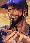 1boy baseball_cap beard black_hair blue_headwear brown_eyes earrings facial_hair hankuri hat jewelry male_focus official_alternate_costume outdoors rashid_(street_fighter) ring solo street_fighter street_fighter_v teeth upper_body