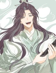  1boy absurdres bindi brown_hair chinese_clothes ddinut earrings folded_fan folding_fan green_background green_eyes green_hanfu hand_fan hanfu highres holding holding_fan jewelry korean_commentary long_hair long_sleeves looking_at_viewer male_focus open_mouth shi_qingxuan smile solo teeth tianguan_cifu upper_body upper_teeth_only wide_sleeves xiao_guan_(headdress) 