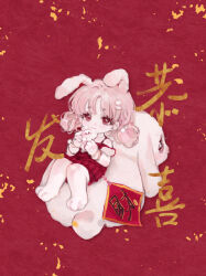  1girl animal animal_ears animal_feet bare_legs bare_shoulders barefoot chibi chinese_commentary chinese_text chinese_zodiac closed_mouth clothing_cutout collarbone commentary_request double_bun dress ennki eyelashes floppy_ears fur-trimmed_sleeves fur_trim fur_wrist_cuffs hair_bun hair_ornament hairclip happy highres holding holding_stuffed_toy looking_at_viewer original oversized_animal pink_hair pom_pom_(clothes) pom_pom_hair_ornament rabbit rabbit_ears rabbit_girl red_background red_dress red_eyes short_hair short_sleeves shoulder_cutout sitting_on_animal smile solo stuffed_animal stuffed_rabbit stuffed_toy white_wrist_cuffs wrist_cuffs year_of_the_rabbit 