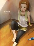  arm_support barefoot blush bottle brown_eyes brown_hair drumsticks face feet hairband highres k-on! leggings shigureteki short_hair sitting smile solo tainaka_ritsu towel water_bottle wristband 