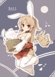  7010 animal_ears bare_shoulders blonde_hair blush breasts bunny bunny_ears bunny_tail choker cleavage food heart long_hair mochi moon new_year original rabbit red_eyes solo tail wagashi 