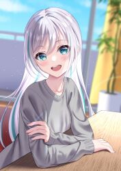  1girl aqua_eyes arms_on_table blue_sky blurry blurry_background blush choppy_bangs collarbone commentary_request crossed_arms day depth_of_field dutch_angle film_grain grey_hair grey_sweater hair_between_eyes hand_on_own_arm highres hominotsu indoors long_bangs long_hair long_sleeves looking_at_viewer open_mouth original sky smile solo straight_hair sweater swept_bangs table upper_body wooden_table 