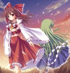 floating_hair from_behind gohei hakurei_reimu highres kochiya_sanae multiple_girls ofuda skirt skywaker standing sunset touhou wind