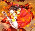  bow brown_eyes brown_hair detached_sleeves discharge_cycle hair_bow hair_tubes hakurei_reimu miko ofuda solo touhou 