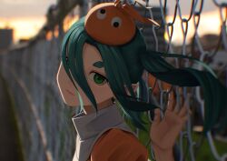  1girl absurdres aqua_hair chain-link_fence closed_mouth evening fence googly_eyes green_eyes hat highres looking_at_viewer monogatari_(series) nemo_ringo ononoki_yotsugi orange_hat outdoors pointy_ears solo thick_eyebrows twintails 