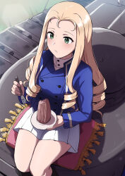  1girl bc_freedom_military_uniform black_boots blonde_hair blue_jacket boots buttons cake drill_hair eating food fork gabuillust girls_und_panzer green_eyes highres holding holding_fork holding_plate jacket long_hair marie_(girls_und_panzer) military_vehicle motor_vehicle on_cushion plate shadow sitting skirt tank white_skirt 