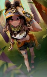  1girl animal_ears animification bandana bandana_around_neck bent_over blurry blurry_foreground brown_hair brown_shoes brown_shorts chinchilla_ears chinchilla_girl commentary cosplay crop_top day english_commentary fur-lined_gloves fur-trimmed_mittens fur_trim genshin_impact gloves grass green_eyes hand_on_another's_head hand_up kachina_(genshin_impact) kachina_(genshin_impact)_(cosplay) kanako_(fuwachu) kemonomimi_mode kristen_mcguire leaf long_hair mittens navel orange_mittens orange_visor outdoors plant real_life shirt shoes shorts sidelocks smile sparkle stomach tree visor_cap voice_actor voice_actor_connection 