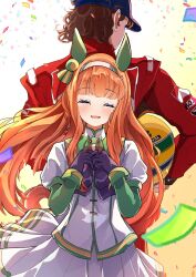  1boy 1girl absurdres animal_ears ayrton_senna blunt_bangs blush bow brown_hair ear_bow ear_covers ear_flower formula_one hair_ornament hairband helmet highres hime_cut horse_ears horse_girl horse_tail long_hair long_sleeves orange_hair orange_tail real_life school_uniform shirt silence_suzuka_(innocent_silence)_(umamusume) silence_suzuka_(umamusume) skirt smile tail tracen_school_uniform umamusume white_hairband yu-muge 