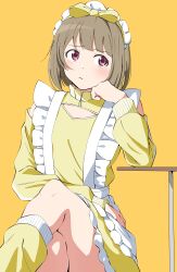  1girl :/ absurdres apron blush bow brown_hair closed_mouth clothing_cutout commentary_request crossed_legs dress feet_out_of_frame frilled_apron frills hair_bow highres jersey_maid leg_warmers long_sleeves looking_to_the_side love_live! love_live!_nijigasaki_high_school_idol_club maid maid_headdress nakasu_kasumi official_alternate_costume pink_eyes short_hair shoulder_cutout simple_background sitting solo uchuu_no_mozuku unconventional_maid waist_apron white_apron yellow_background yellow_bow yellow_dress yellow_leg_warmers 