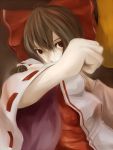  bow brown_eyes brown_hair clenched_hand fist foreshortening ghostshell0083 hair_bow hakurei_reimu solo touhou 
