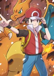  1boy absurdres backpack backsine bag blue_pants brown_eyes brown_hair charizard closed_mouth commentary fire hand_on_headwear hat highres male_focus pants pointing pokemon pokemon_(creature) pokemon_frlg popped_collar red_(pokemon) red_hat red_vest shirt short_sleeves vest wristband yellow_bag 