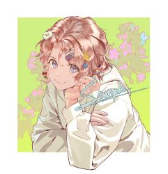  1girl blonde_hair blush border bow closed_mouth commission cropped_torso fingernails floral_background flower green_background hair_between_eyes hair_bow hair_flower hair_ornament hairclip hairpin hand_on_own_arm hand_on_own_face hand_up highres hood hoodie long_sleeves looking_at_viewer original outside_border pink_flower puffy_long_sleeves puffy_sleeves rainbow_hair_ornament red_bow short_hair smile solo star_(symbol) star_hair_ornament upper_body violet_eyes wavy_hair white_border white_flower white_hoodie yellow_bow zhongerweiyuan 