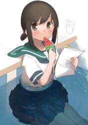  1girl black_hair blue_sailor_collar blue_skirt blush commentary food fubuki_(kancolle) green_eyes highres holding holding_food holding_paper kantai_collection looking_at_viewer ma_rukan paper partially_submerged ponytail popsicle sailor_collar school_uniform serafuku short_hair short_ponytail short_sleeves signature skirt solo watermelon_bar 