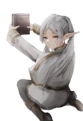  1girl absurdres black_pants book boots brown_boots earrings elf frieren green_eyes hazuki_kono highres holding holding_book jewelry pants pointy_ears simple_background smile sousou_no_frieren teardrop_earrings twintails white_background white_hair 