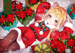  1girl black_pantyhose blonde_hair blue_eyes blush box breath christmas commentary_request dress flower fur_trim gift gift_box kink_(tortoiseshell) long_hair looking_at_viewer lying on_back original pantyhose poinsettia pom_pom_(clothes) santa_costume santa_dress smile snow solo 