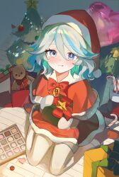  1girl bell blue_eyes boots bow box box_of_chocolates capelet chocolate christmas_present christmas_tree closed_mouth commentary dress drop-shaped_pupils full_body furina_(genshin_impact) genshin_impact gift gift_box hat heart highres long_sleeves looking_at_viewer mittens multicolored_hair red_boots red_bow red_capelet red_dress sa_mhe santa_costume santa_hat short_hair sitting smile star_(symbol) stuffed_animal stuffed_toy symbol-shaped_pupils teddy_bear thigh-highs untranslatable_commentary wariza white_boots white_hair white_mittens white_thighhighs wide_sleeves 