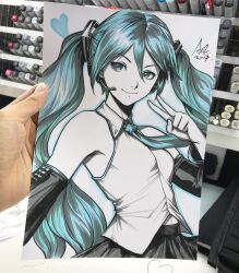  1girl 2017 aqua_eyes aqua_hair aqua_necktie art_tools_in_frame artist's_hand_in_frame black_skirt breasts closed_mouth commentary detached_sleeves english_commentary hatsune_miku headset heart highres long_hair marker_(medium) necktie photo_(medium) shirt signature skirt sleeveless smile solo stanley_lau traditional_media twintails upper_body v very_long_hair vocaloid white_shirt 