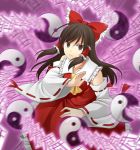  ascot bow brown_eyes brown_hair detached_sleeves hair_bow hakurei_reimu jenevan long_hair miko ofuda solo spell_card touhou yin_yang 