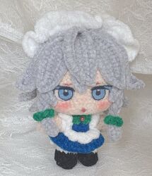  1girl :o amigurumi_(medium) blue_dress blue_eyes blush chibi chibi_only dress full_body grey_hair highres izayoi_sakuya looking_ahead looking_at_viewer maid_headdress moni_monico open_mouth photo_(medium) sidelocks solo straight-on touhou unconventional_media 