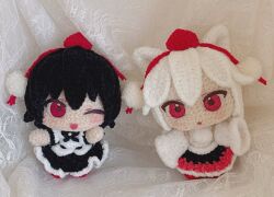  2girls amigurumi_(medium) animal_ears black_hair black_skirt chibi chibi_only commentary_request detached_sleeves full_body hat highres inubashiri_momiji looking_at_viewer moni_monico multiple_girls one_eye_closed photo_(medium) red_eyes red_hat red_skirt shameimaru_aya shirt skirt sleeveless sleeveless_shirt tokin_hat touhou two-tone_skirt unconventional_media white_hair white_shirt white_sleeves wolf_ears wolf_girl 