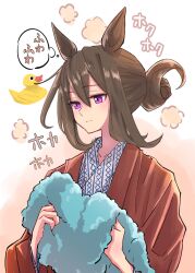  1girl admire_vega_(umamusume) animal_ears bath_yukata blush brown_hair closed_mouth commentary_request gogono_pan'ya grey_kimono hair_between_eyes hair_bun highres holding holding_towel horse_ears horse_girl japanese_clothes kimono long_hair long_sleeves red_robe robe rubber_duck smile solo towel umamusume upper_body violet_eyes yukata 